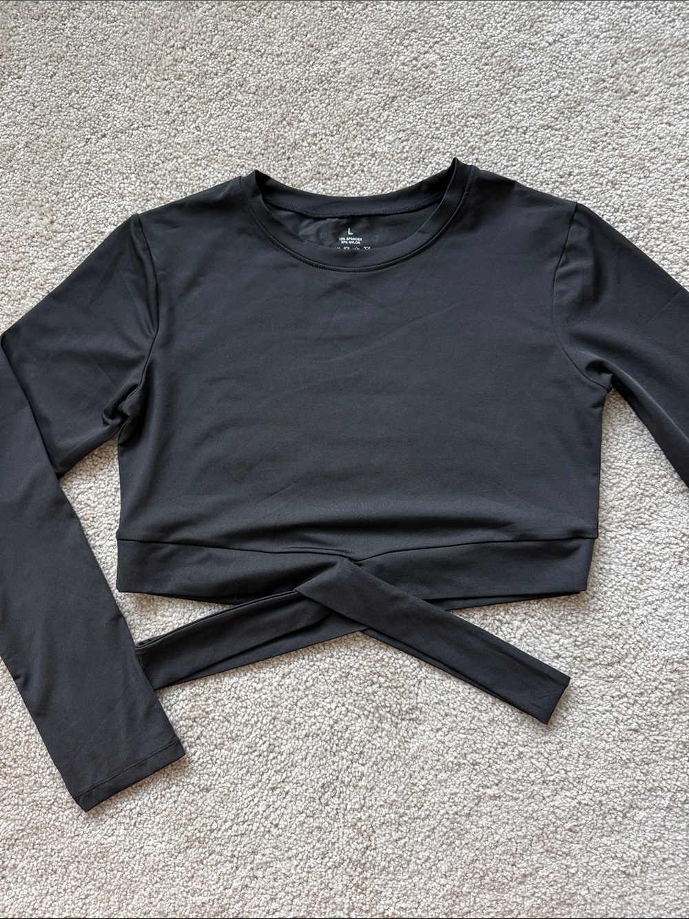 NVGTN Black Crossbody Cutout Long Sleeve Crop Workout Top